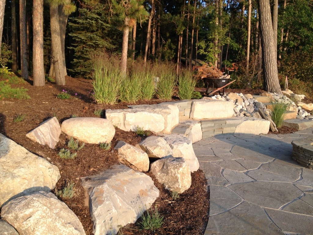 3 Things To Know About Using Large Rocks In Landscaping Peninsula Pavers