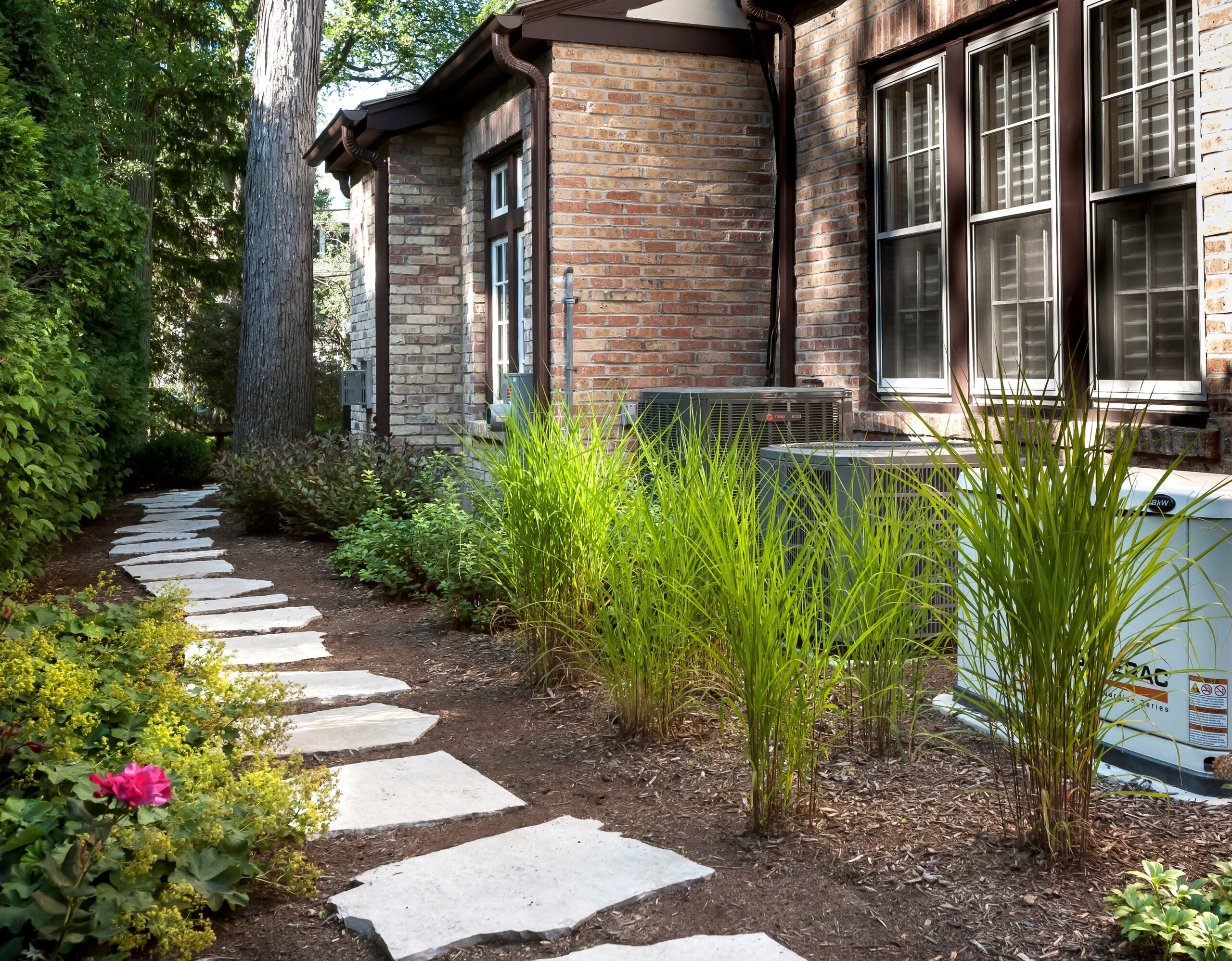 5 Ways To Hide That Big Air Conditioner In Your Yard
