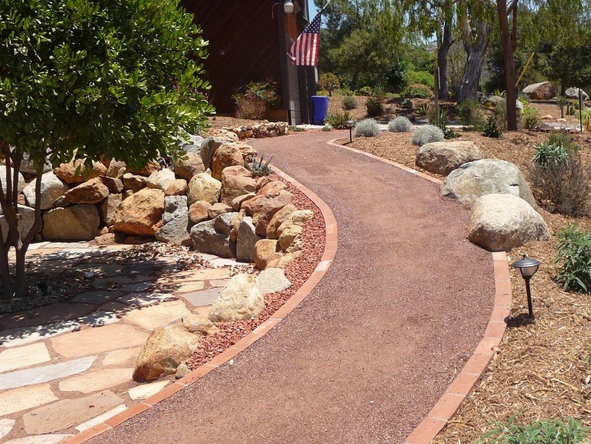 6 Benefits Of Red Lava Rock For Landscaping Evans Construction