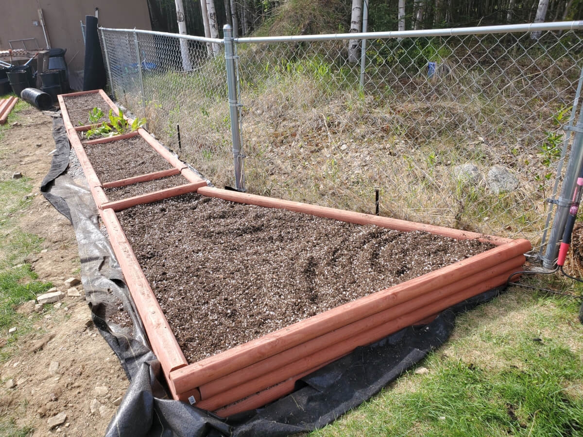 Building DIY Raised Beds From Landscape Timbers
