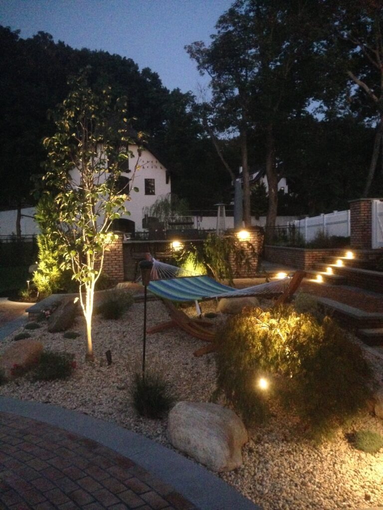 Innovative Outdoor Lighting Techniques To Highlight Your Landscaping In Huntington And Hamptons NY Landscaping Salt Water Pool Islip NY Outdoor Fireplace Glen Cove NY The Platinum Group